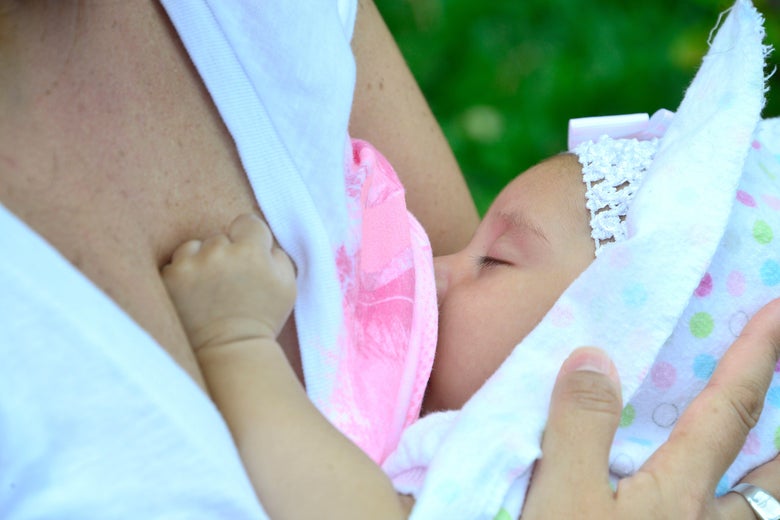 Women — some of them breastfeeding — carry out a mamaton (from Spanish amamantar, breastfeed and "marathon") outside the Legislative Assembly in San Jose, Costa Rica on August 3, 2016.